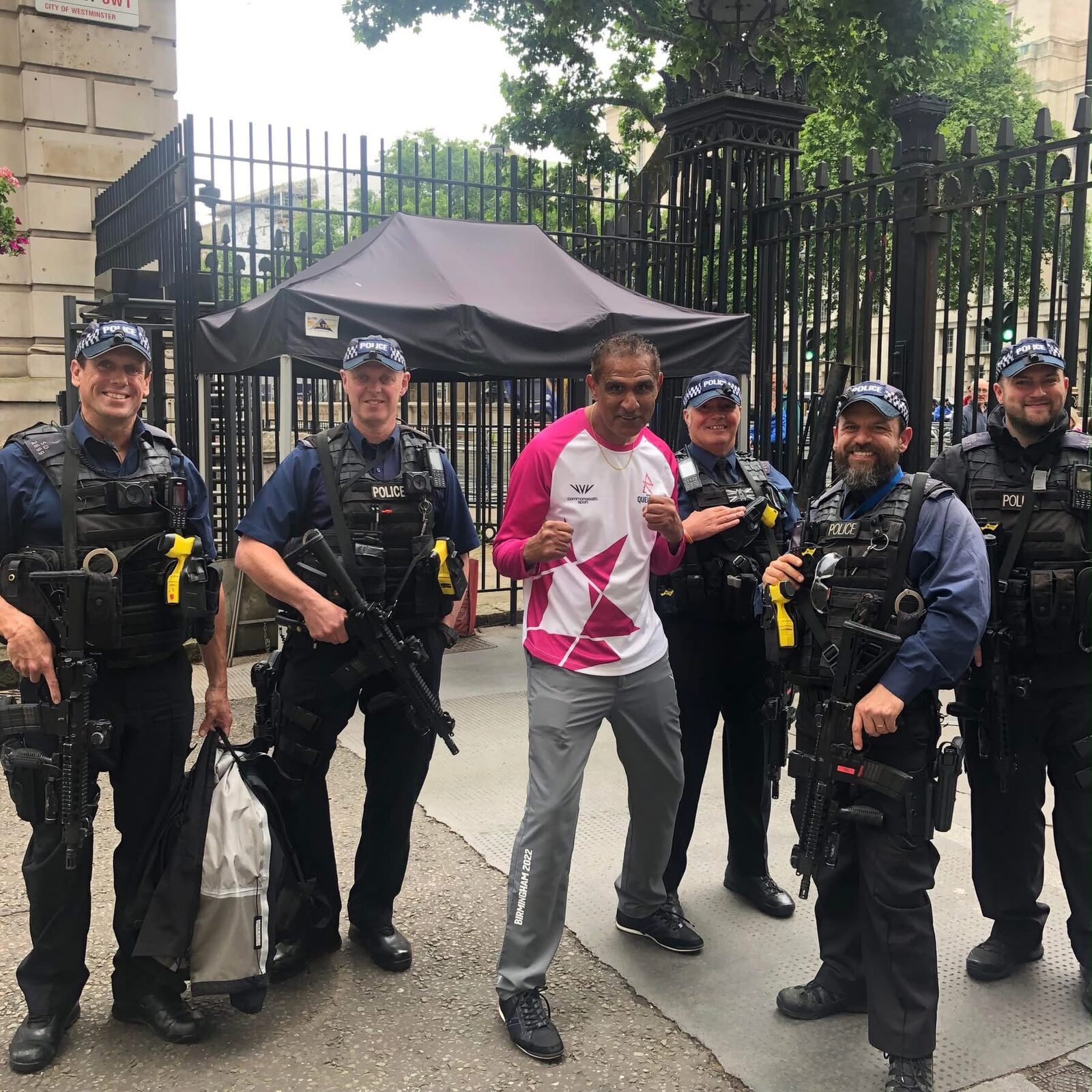 Kash with the Queen's Baton at Downing Street